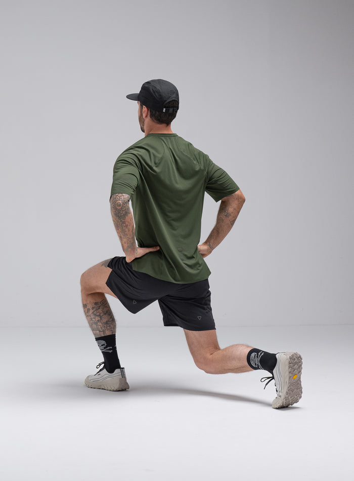Chez Is 6ft And Wears Size: M | Hem Studio Image Of Model Wearing Force Trail Running 7" Shorts In Obsidian Black (SS Model)