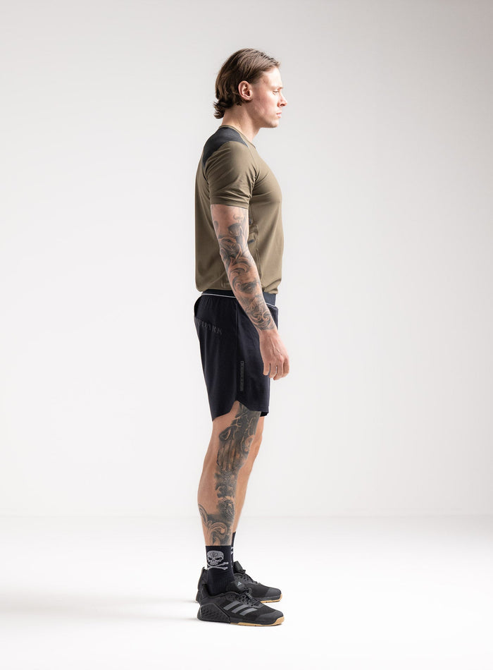 Angus Is 6ft 4" And Wears Size: L | Hem Studio Image Of Model Wearing Force Velocity 2-In-1 Short G2 In Black (SS Model)