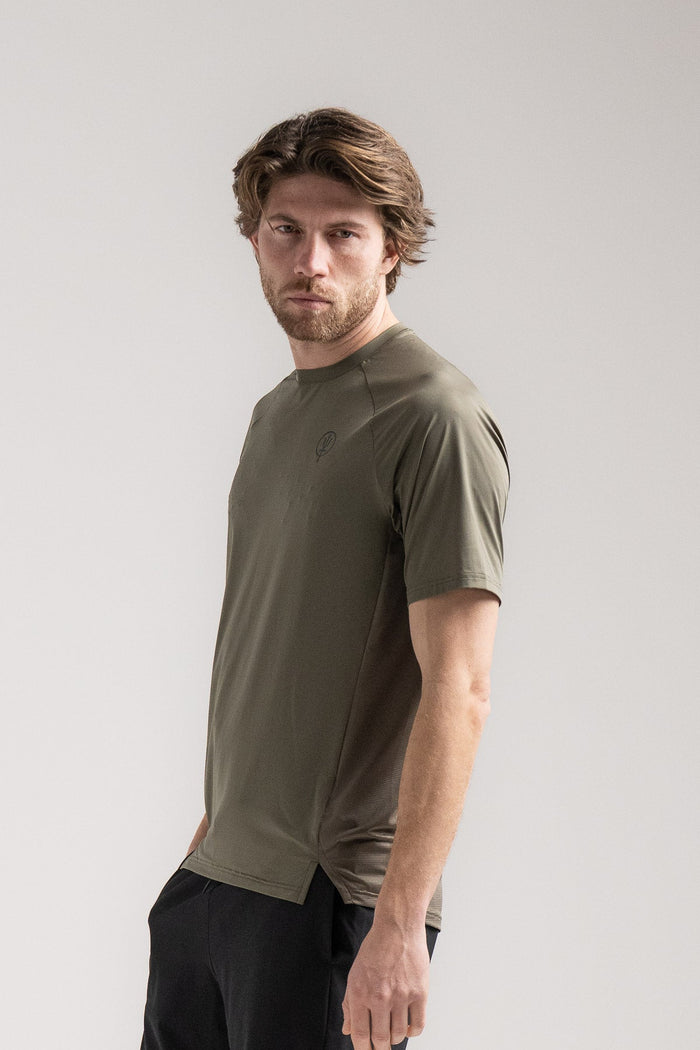 Rudie Is 6ft 2" And Wears Size: M | Hem Studio Image Of Model Wearing Force Velocity Motion T-Shirt In Khaki (SS Model)