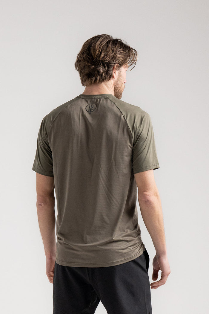 Rudie Is 6ft 2" And Wears Size: M | Hem Studio Image Of Model Wearing Force Velocity Motion T-Shirt In Khaki (SS Model)