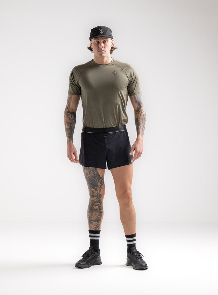 Angus Is 6ft 4" And Wears Size: L | Hem Studio Image Of Model Wearing Force Velocity Split Short In Obsidian Black (SS Model)