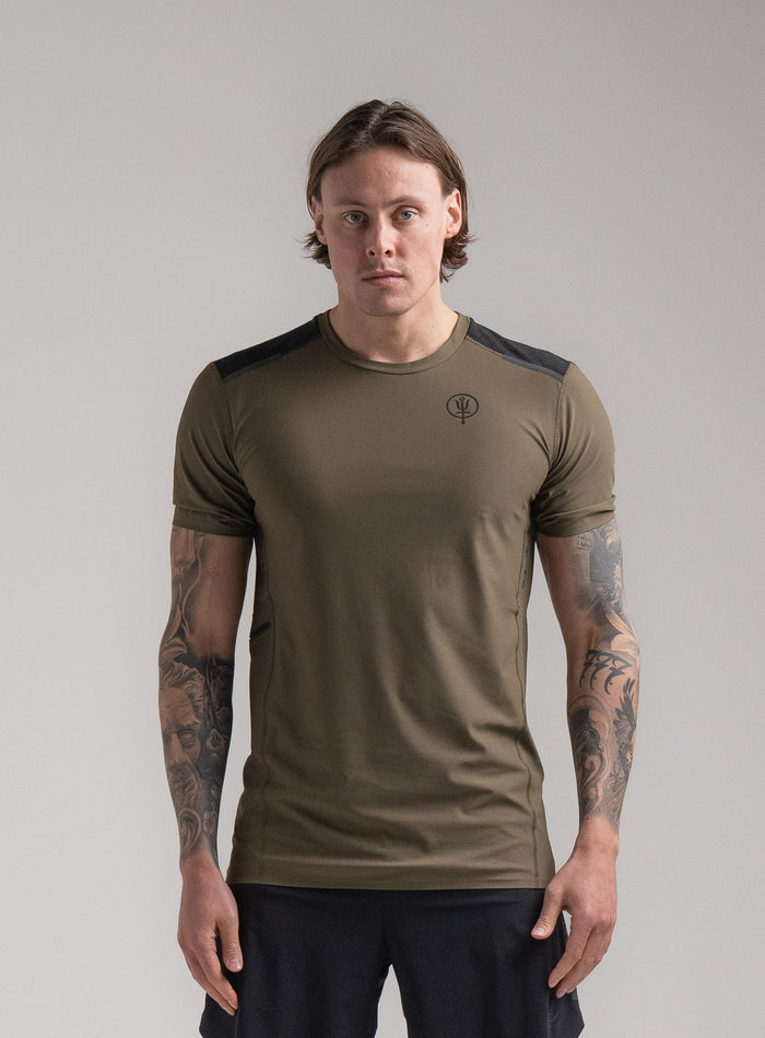 Angus Is 6ft 4" And Wears Size: L | Hem Studio Image Of Model Wearing Force Velocity Technical T-Shirt In Khaki (SS Model)