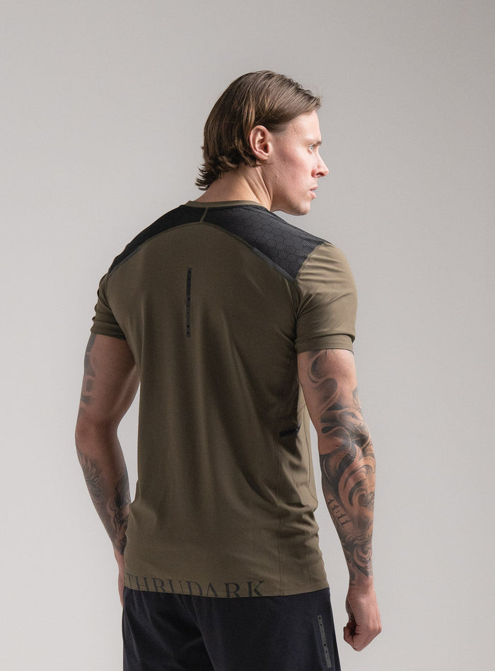 Angus Is 6ft 4" And Wears Size: L | Hem Studio Image Of Model Wearing Force Velocity Technical T-Shirt In Khaki (SS Model)