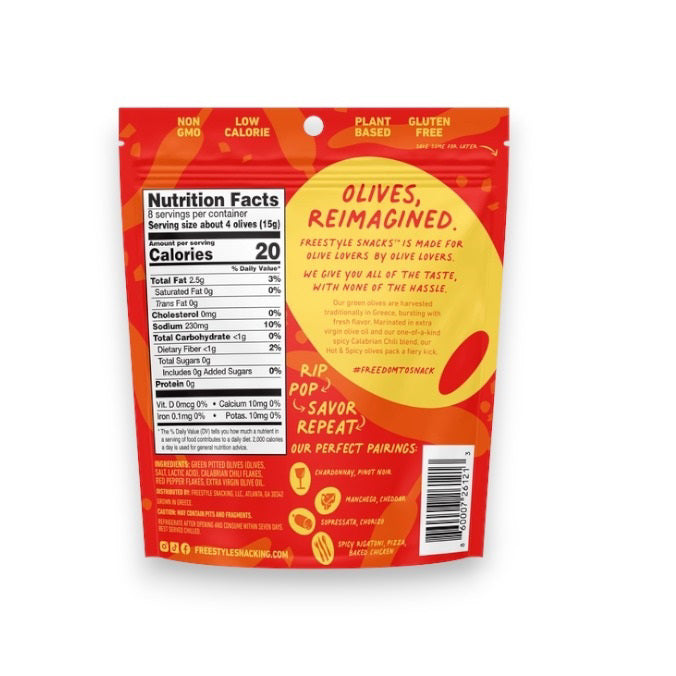 A red package of FREESTYLE - HOT & SPICY GREEN OLIVES by FREESTYLE SNACKS features Calabrian chili-accented green olives. The design highlights olives, chilies, "All Natural," "Grown in Greece," and emphasizes "Healthy Snacking on the Go." Net weight: 4 oz (113g).