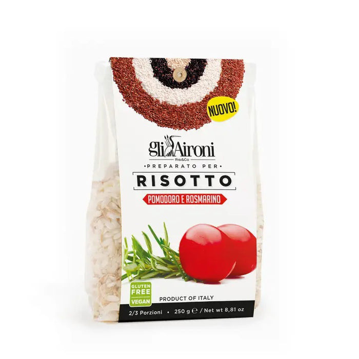 A package of ZIA PIA IMPORTS GLI AIRONI - TOMATO AND ROSEMARY RISOTTO, with carnaroli rice, tomatoes, and rosemary. Vegan, gluten free, made in Italy—enjoy an authentic Italian risotto. Colorful circular design on packaging.