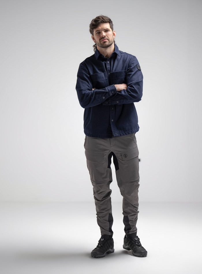 Bernie Is 6ft And Wears Size: M | Hem Studio Image Of Model Wearing Heavy Twill Overshirt In Dark Sapphire (SS Model)