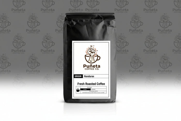 Black coffee bag with Puánta Coffee Co. label