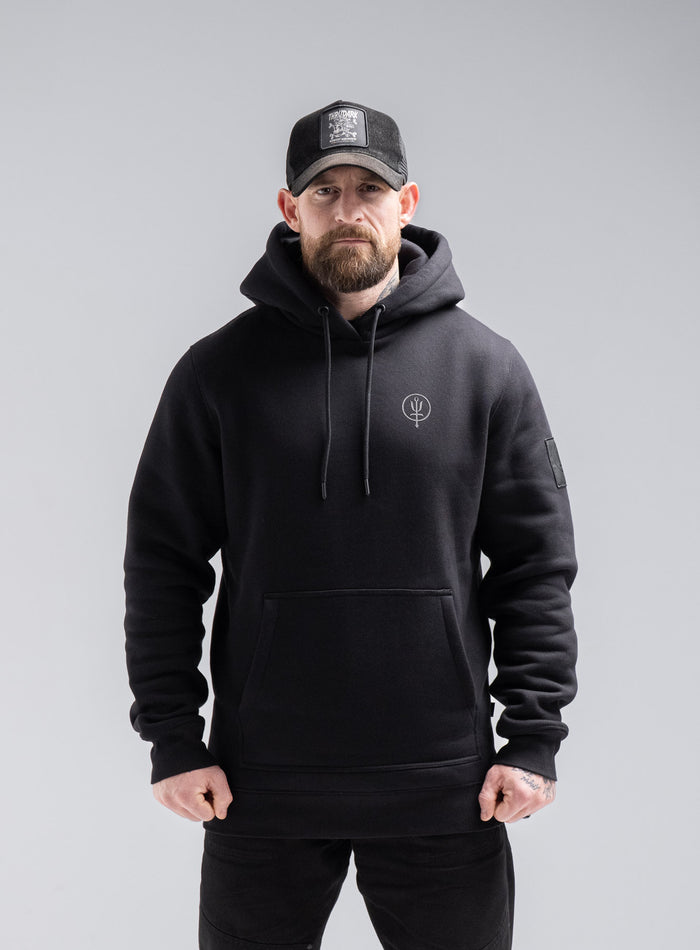 Staz Is 5ft 8" And Wears Size: S | Hem Studio Image Of Model Wearing Insignia Hoody - Thrudark X Scramble In Obsidian Black (SS Model)