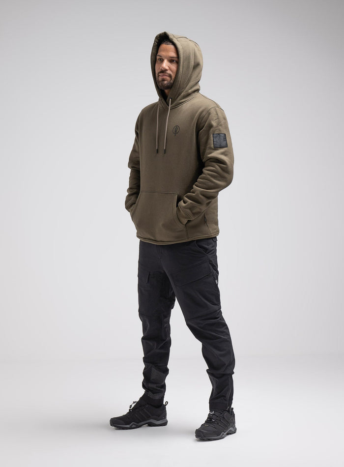 Dj Is 6ft 4" And Wears Size: Xl | Hem Studio Image Of Model Wearing Insignia Hoody In Khaki (SS Model)