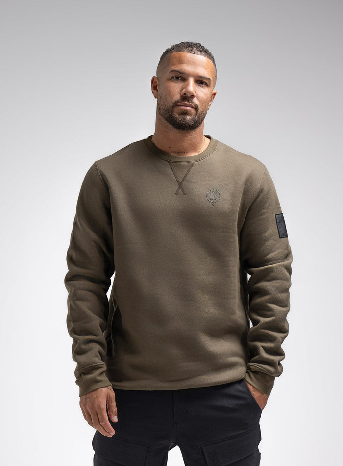 Dj Is 6ft 4" And Wears Size: Xl | Hem Studio Image Of Model Wearing Insignia Jumper In Khaki (SS Model)