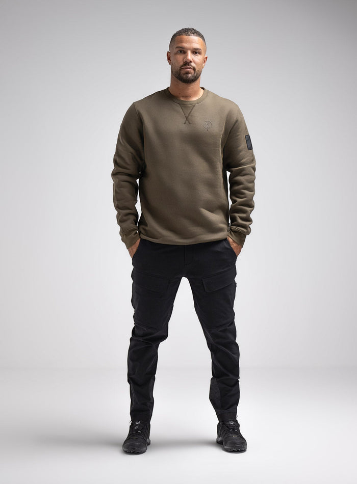 Dj Is 6ft 4" And Wears Size: Xl | Hem Studio Image Of Model Wearing Insignia Jumper In Khaki (SS Model)