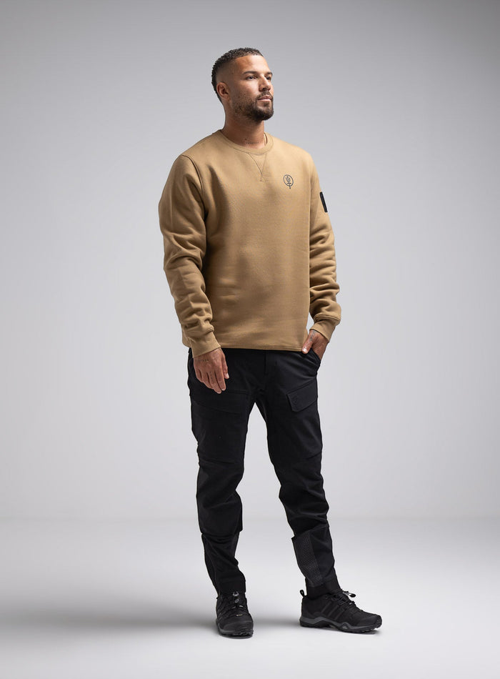 Dj Is 6ft 4" And Wears Size: Xl | Hem Studio Image Of Model Wearing Insignia Jumper In Sand (SS Model)