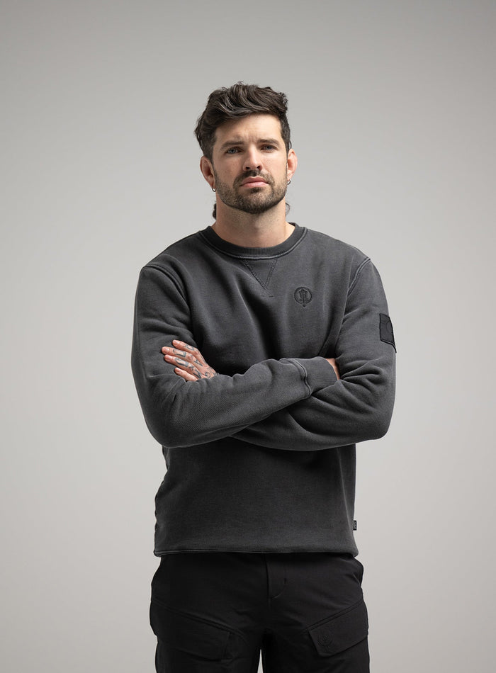 Bernie Is 6ft And Wears Size: M | Hem Studio Image Of Model Wearing Insignia Jumper Washed In Grey (SS Model)