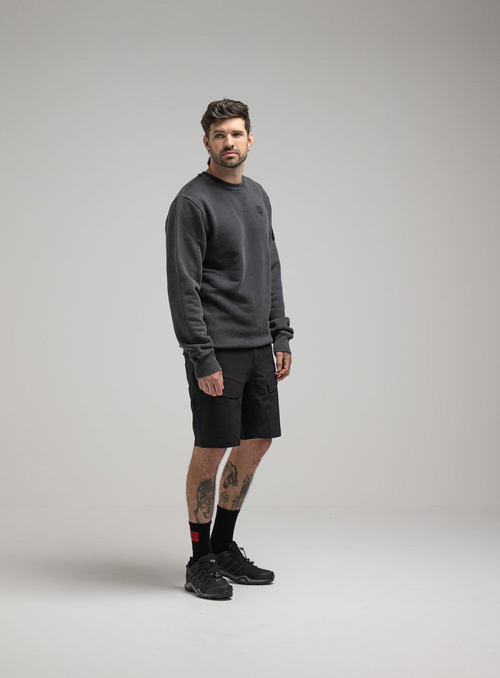 Bernie Is 6ft And Wears Size: M | Hem Studio Image Of Model Wearing Insignia Jumper Washed In Grey (SS Model)