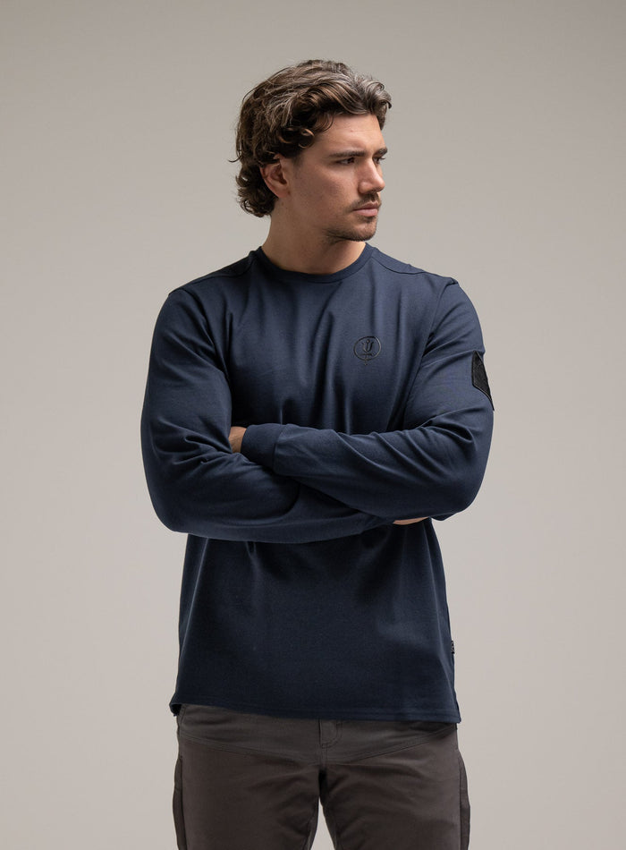 George Is 5ft 11" And Wears Size: S | Hem Studio Image Of Model Wearing Insignia Long Sleeve T-Shirt G1 In Dark Sapphire (SS Model)