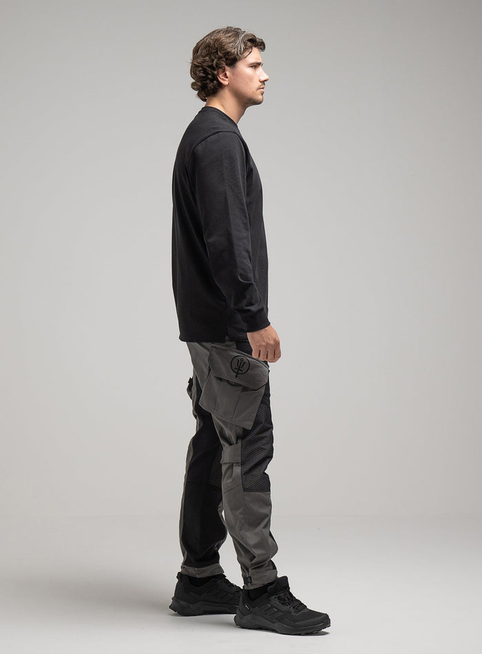 George Is 5ft 11" And Wears Size: S | Hem Studio Image Of Model Wearing Insignia Long Sleeve T-Shirt G1 In Obsidian Black (SS Model)