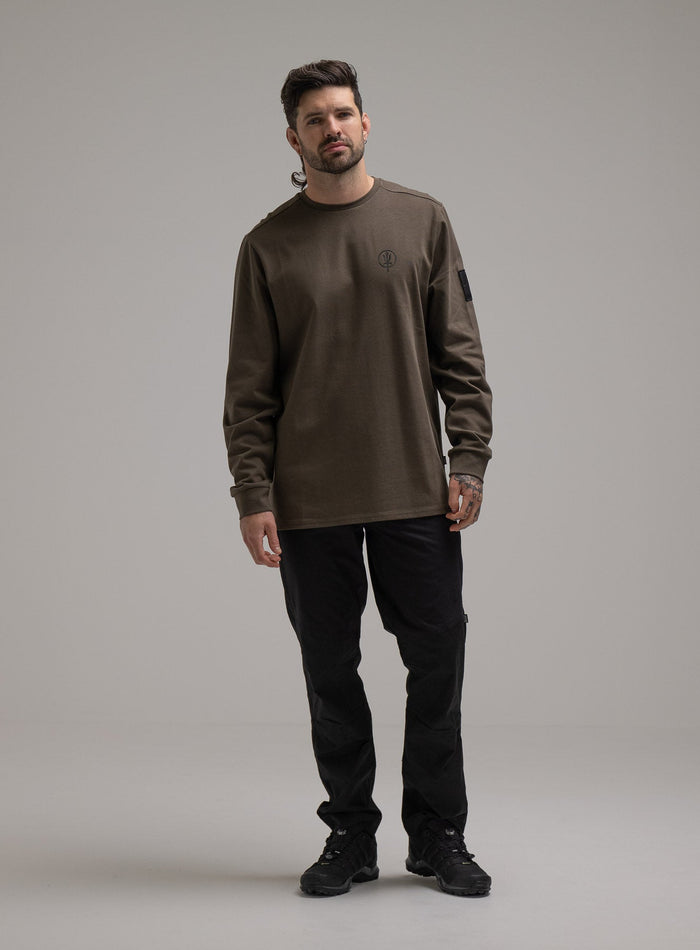 George Is 5ft 11" And Wears Size: S | Hem Studio Image Of Model Wearing Insignia Long Sleeve T-Shirt G1 In Khaki (SS Model)