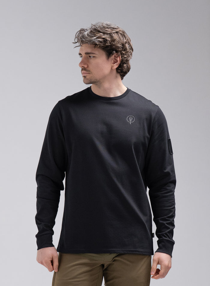Jack Is 6ft 3" And Wears Size: L | Hem Studio Image Of Model Wearing Insignia Long Sleeve T-Shirt In Obsidian Black (SS Model)