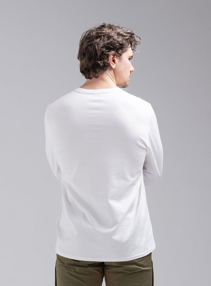Jack Is 6ft 3" And Wears Size: L | Hem Studio Image Of Model Wearing Insignia Long Sleeve T-Shirt In Optic White (SS Model)