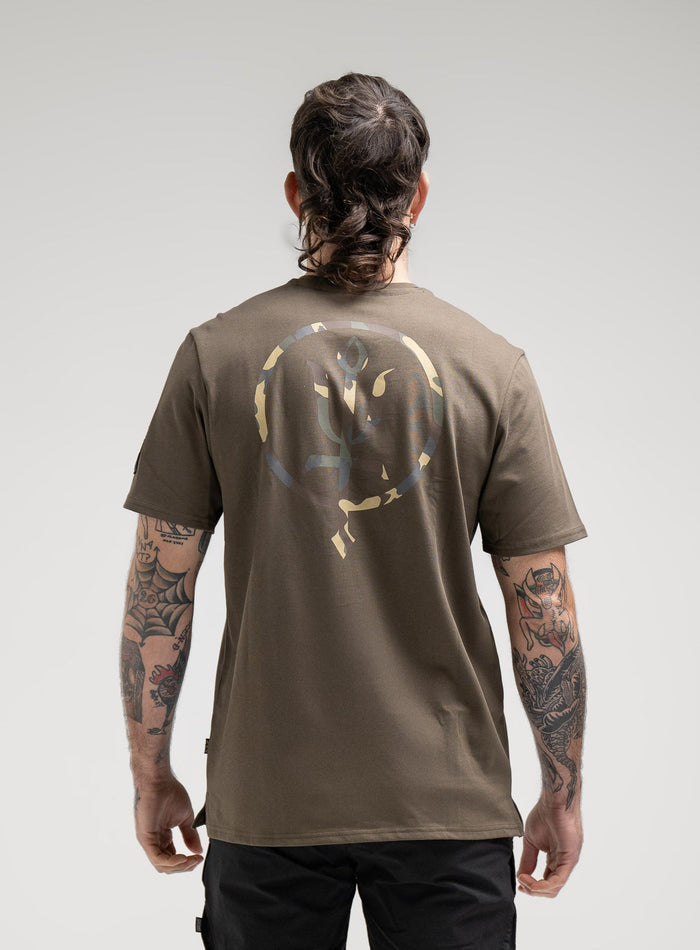 Bernie Is 6ft And Wears Size: M | Hem Studio Image Of Model Wearing Insignia T-Shirt - Inception Camo In Khaki (SS Model)