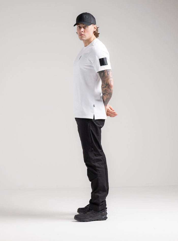 Angus Is 6ft 4" And Wears Size: L | Hem Studio Image Of Model Wearing Insignia T-Shirt - Inception Camo In Optic White (SS Model)
