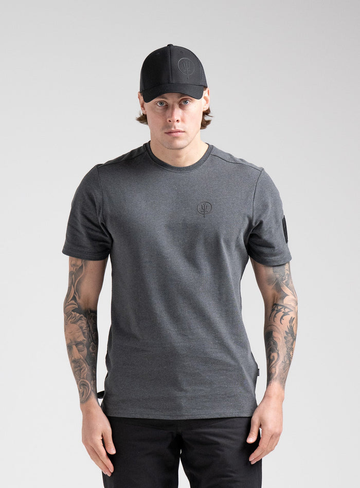 Angus Is 6ft 4" And Wears Size: L | Hem Studio Image Of Model Wearing Insignia T-Shirt - Inception Camo In Charcoal Grey (SS Model)