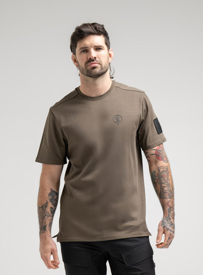 Bernie Is 6ft And Wears Size: M | Hem Studio Image Of Model Wearing Insignia T-Shirt - Inception Camo In Khaki (SS Model)
