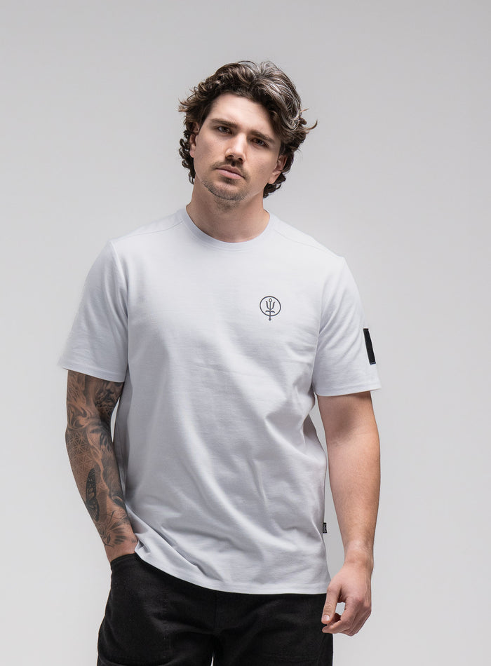 Jack Is 6ft 3" And Wears Size: L | Hem Studio Image Of Model Wearing Insignia T-Shirt - Love Many Trust Few In Optic White (SS Model)