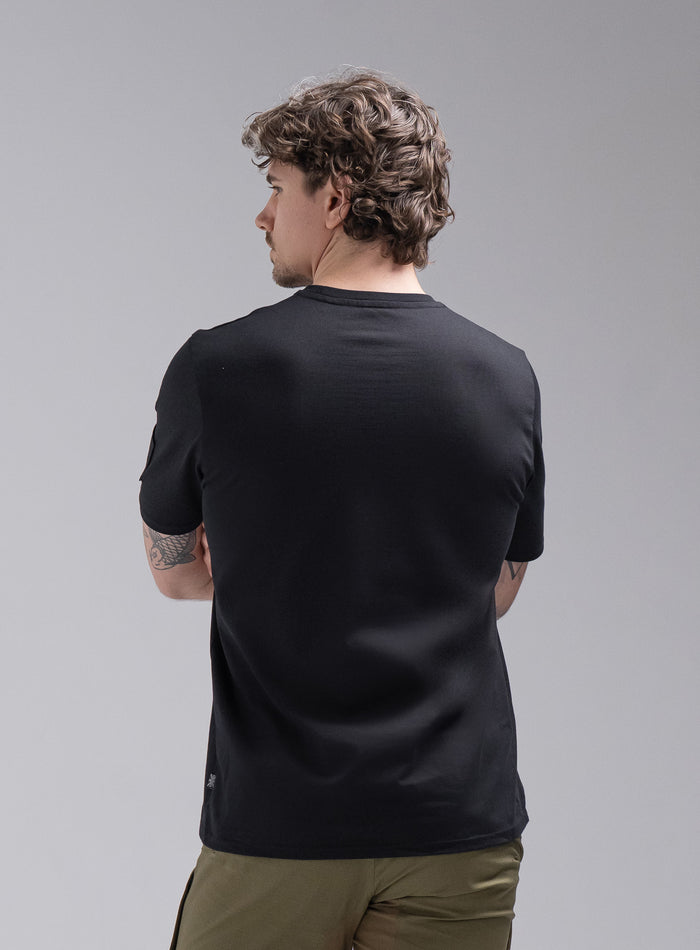 Jack Is 6ft 3" And Wears Size: L | Hem Studio Image Of Model Wearing Insignia Short Sleeve T-Shirt In Obsidian Black (SS Model)