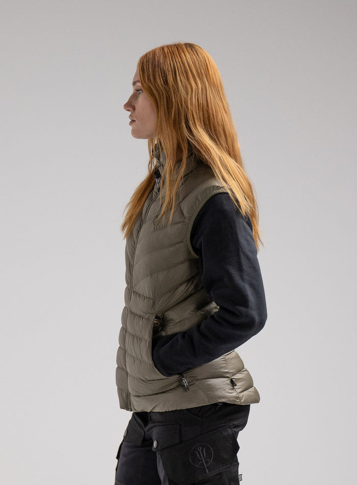 Miki Is 5ft 8" And Wears Size: S | Hem Studio Image Of Model Wearing Ithax Gilet Womens In Olive Green (SS Model)