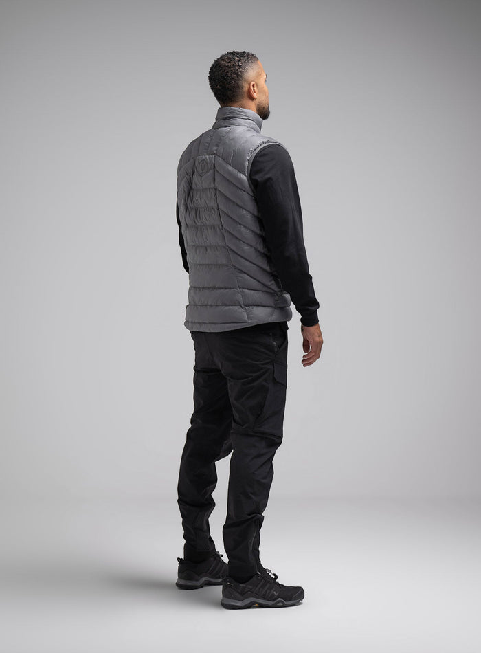 Dj Is 6ft 4" And Wears Size: Xl | Hem Studio Image Of Model Wearing Ithax Gilet In Wolf Grey (SS Model)