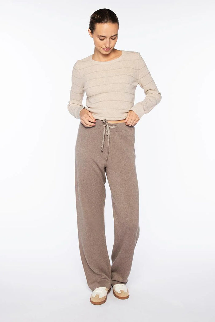 The KINROSS CASHMERE Doubleknit Lurex Drawstring Pant in black features a straight-leg silhouette and luxe cashmere blend for comfortable loungewear, shown on a plain white background.