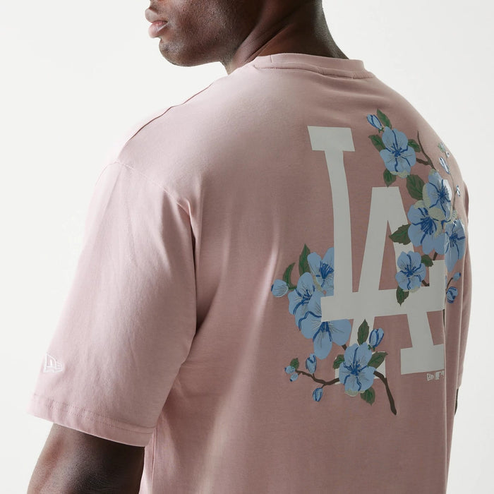 The Male model is wearing LA Dodgers MLB Floral Pastel Pink Oversized T-Shirt 5