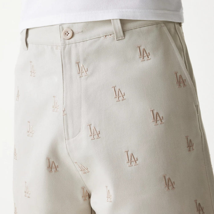 The Male model is wearing LA Dodgers MLB Monogram Cream Shorts 6