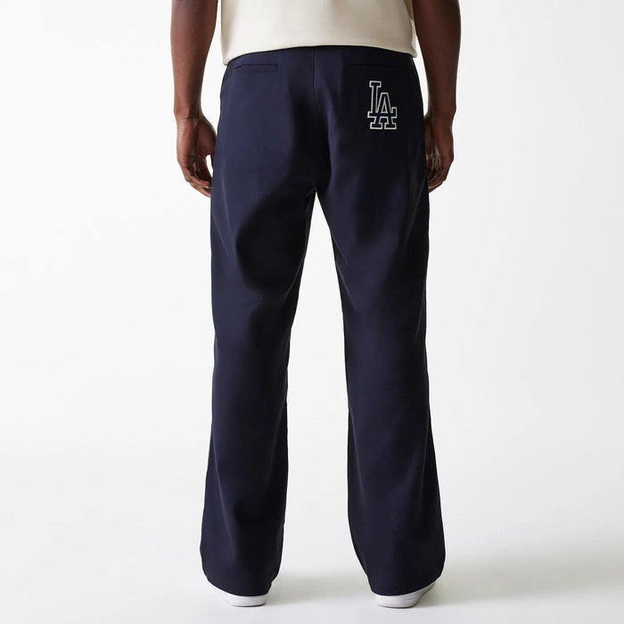 The Male model is wearing LA Dodgers MLB Navy Chino Trousers 2