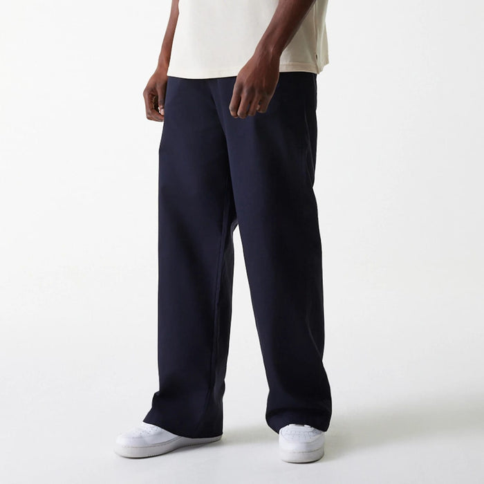 The Male model is wearing LA Dodgers MLB Navy Chino Trousers 3