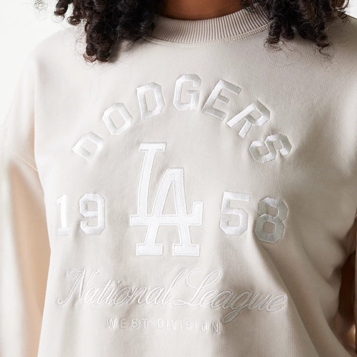 The Female model is wearing LA Dodgers Womens MLB Tonal Graphic Light Beige Oversized Crew Neck Sweater 4