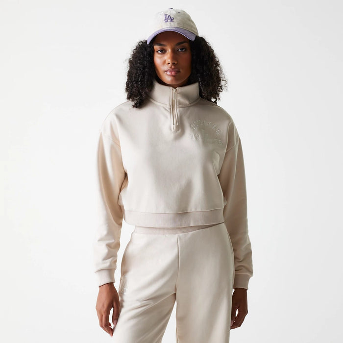 The Female model is wearing LA Dodgers Womens MLB Tonal Light Beige Cropped 1/4 Zip Sweater 1