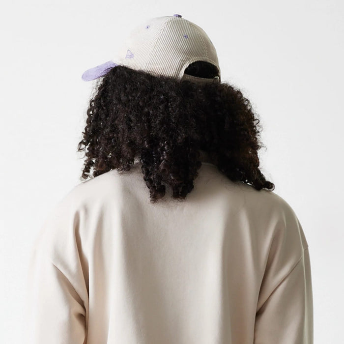The Female model is wearing LA Dodgers Womens MLB Tonal Light Beige Cropped 1/4 Zip Sweater 7