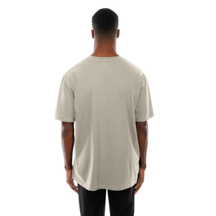 The Male model is wearing LA Lakers Modern Driver Light Beige T-Shirt 7