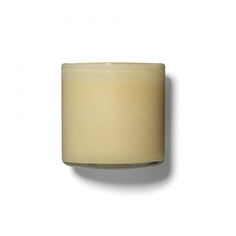 The LAFCO - BEDROOM CHAMOMILE LAVENDER 6.5OZ candle features a soothing blend of lavender and chamomile in a cream-colored wax, set in a simple clear glass container, perfect for relaxing bedroom ambiance.