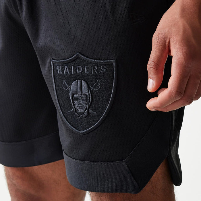 The Male model is wearing Las Vegas Raiders Tonal Pack Black Shorts 3