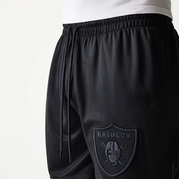 The Male model is wearing Las Vegas Raiders Tonal Pack Black Shorts 5