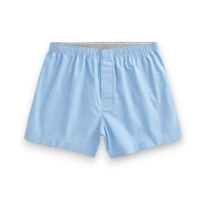 MACK WELDON - 24/7 WOVEN BOXER for men in light blue features a soft, breathable fabric and elastic waistband. Shown front-facing on a white background, these boxers deliver all-day comfort.