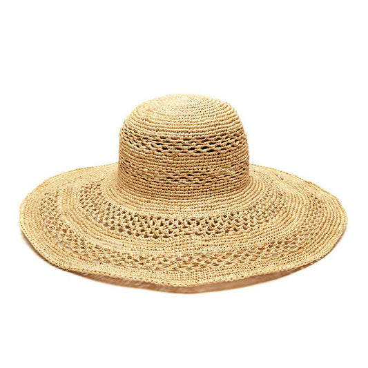 MAR Y SOL - SIENNA SUN HAT by MAR Y SOL features a wide brim, rounded crown, and stylish crocheted raffia design, showcased against a white background.