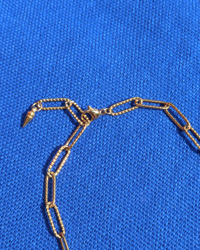 gold paperclip chain bracelet with lobster claw clasp