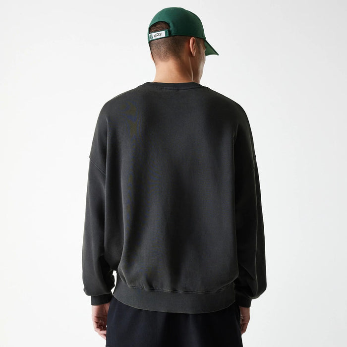 The Male model is wearing Milwaukee Bucks NBA Washed Graphic Grey Oversized Crew Neck Sweater 2
