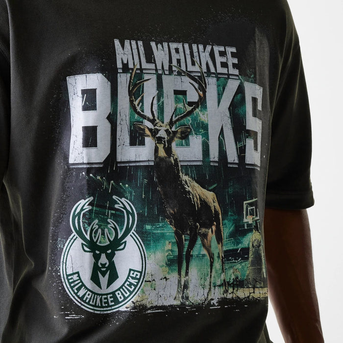 The Male model is wearing Milwaukee Bucks NBA Washed Graphic Grey T-Shirt 6