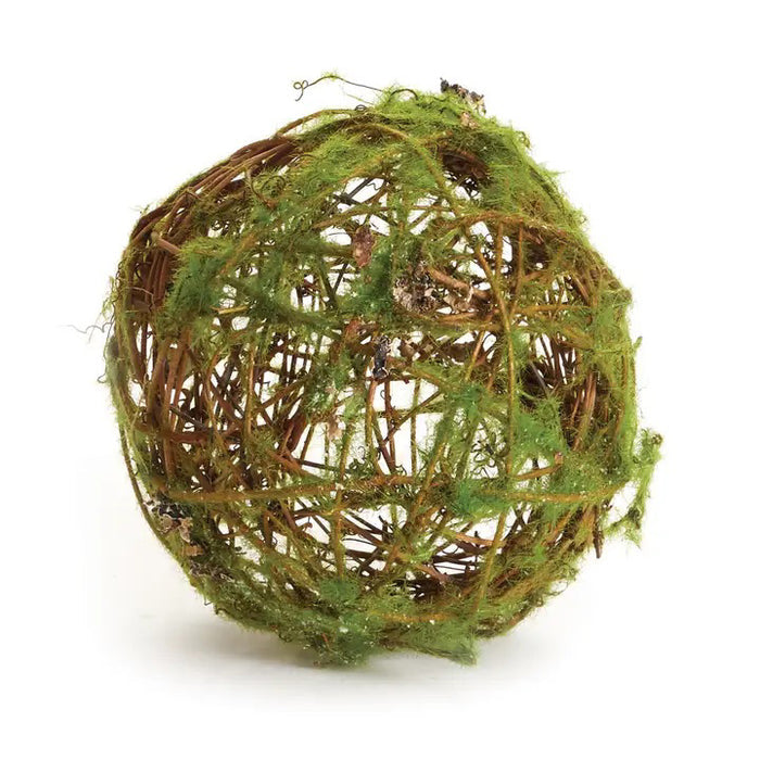The NAPA HOME AND GARDEN MOSSY WRAPPED TWIG ORB 6" features intertwined brown twigs and green moss, creating a natural accent ideal for organic tablescapes. Displayed against a white background.