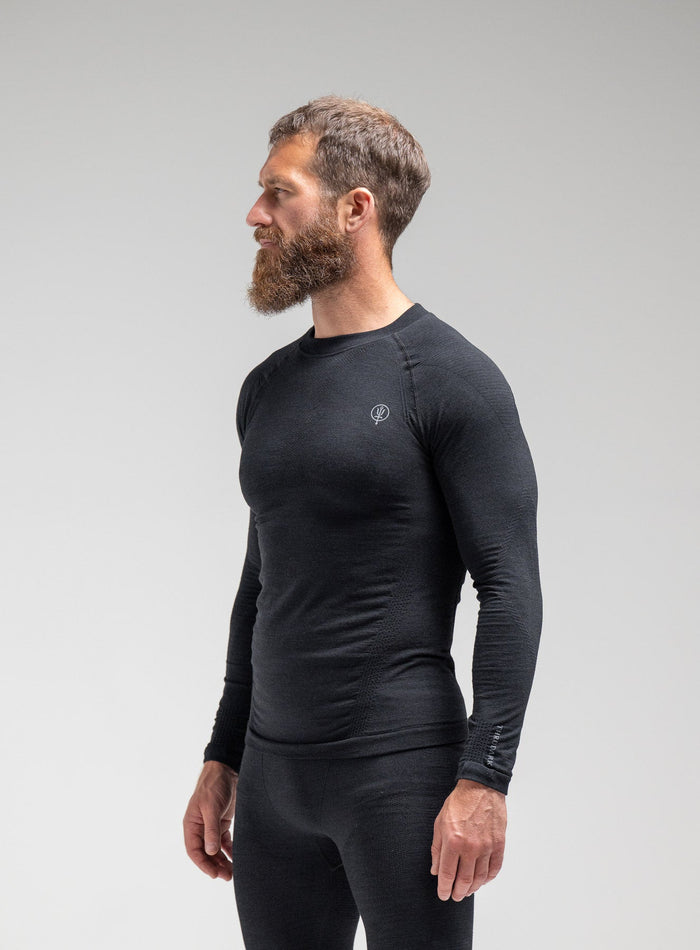 Louis Is 5ft 10" And Wears Size: M | Hem Studio Image Of Model Wearing Mountain Pro Merino Cordura® Base Layer Top In Obsidian Black (SS Model)